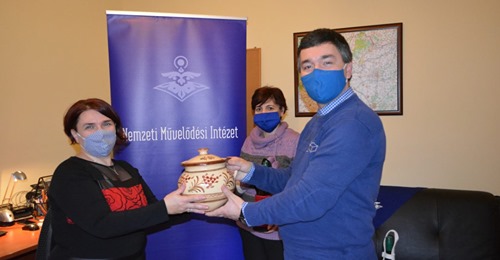 Komatál program